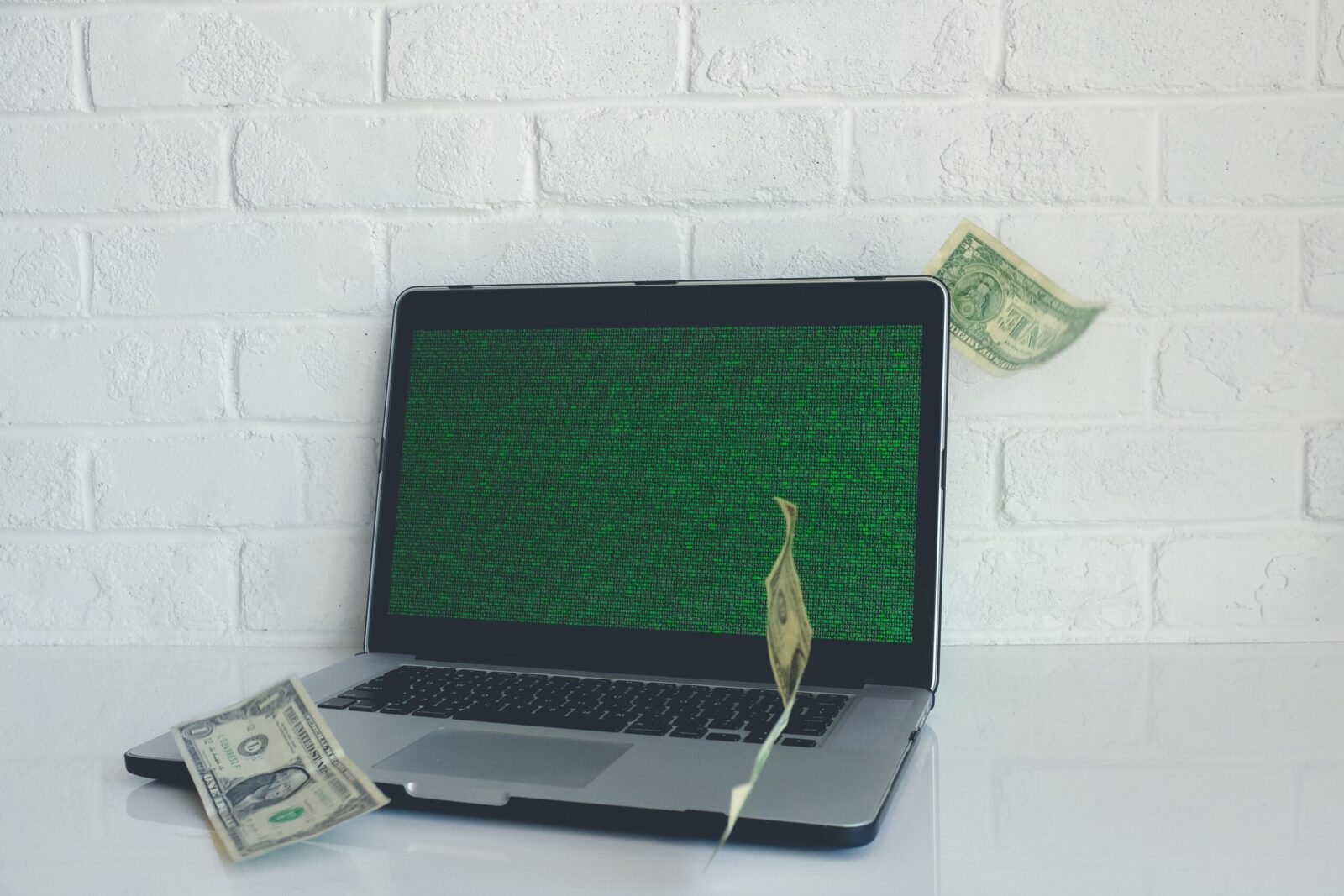 laptop and money